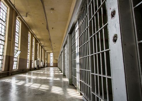 Prison bars and a hallway