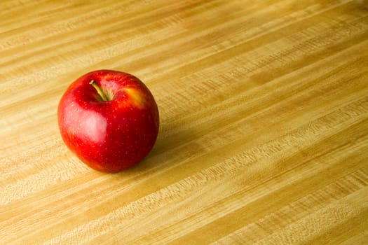 tasty apple just sitting there.