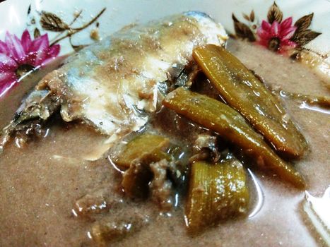 Lotus stem with steamed mackerel in coconut soup