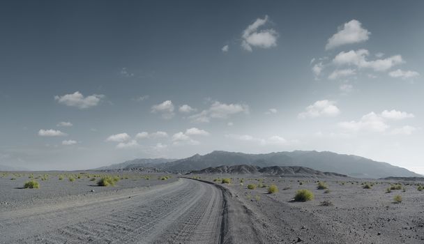 panoramic view of hot dusty  road through the Nevada  desert