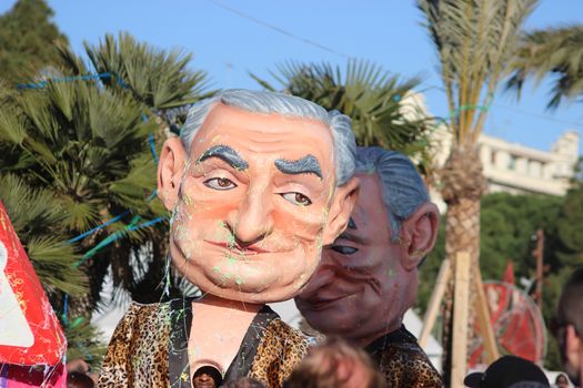 Nice, France - February 21 2016: Caricature of the French politician Dominique Strauss-Kahn (DSK). Parade Float during the Carnival of Nice (Corso Carnavalesque 2016) in French Riviera. The Theme for 2016 was King of Media