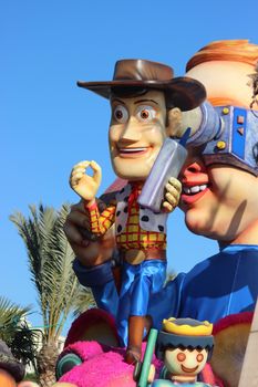 Nice, France - February 21 2016: Sheriff Woody, cowboy of Toy Story. Parade Float during the Carnival of Nice (Corso Carnavalesque 2016) in French Riviera. The Theme for 2016 was King of Media