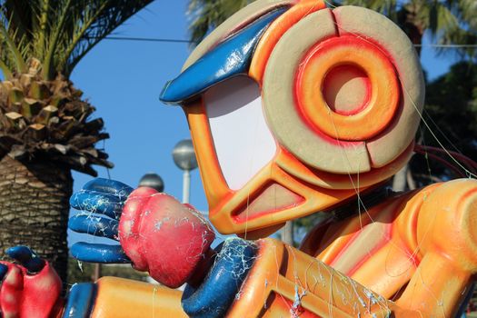 Nice, France - February 21 2016: Orange Future Robot. Parade Float during the Carnival of Nice (Corso Carnavalesque 2016) in French Riviera. The Theme for 2016 was King of Media