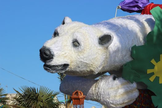 Nice, France - February 21 2016: Giant Polar Bear. Parade Float during the Carnival of Nice (Corso Carnavalesque 2016) in French Riviera. The Theme for 2016 was King of Media