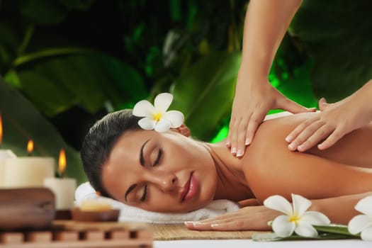 portrait of young beautiful woman in spa environment.