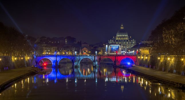 Rome, Italy, january 2016: illuminated bridge with the colors of the french flag for the 60th anniversary of the Rome - Paris twinning Paris is since April 9, 1956 exclusively and reciprocally twinned only with Rome. "Only Paris is worthy of Rome; only Rome is worthy of Paris."