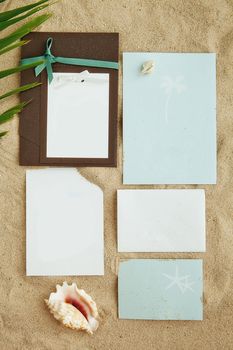 empty cards on sand. free space for your text and images.