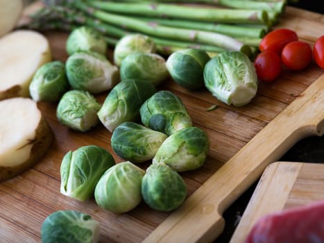 close up view of nice fresh vegetables on color background