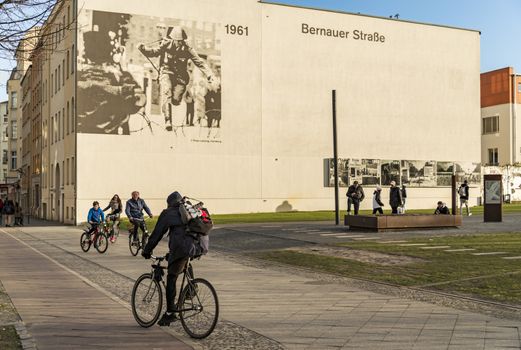 BERLIN - APRIL 3: The Berlin Wall Memorial in Bernauer strasse. This is the intersection with Acker strasse and the photos depict the place over the years on April 3, 2015 in Berlin, Germany.