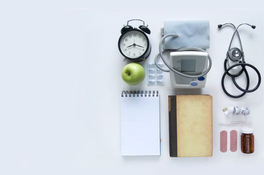 Medical objects laid out on a white table