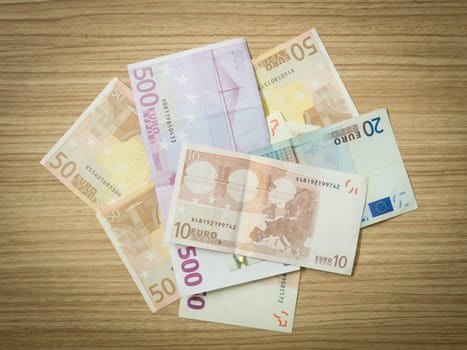 euro banknote  on wood table.