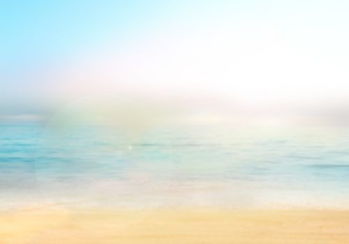 Blurred nature background. Background with beaches, turquoise waters and white clouds, and a bright sun light. Summer holiday concept.