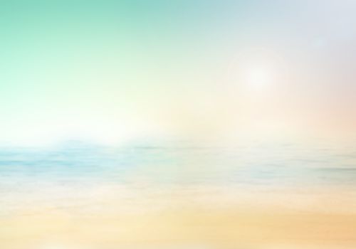 Blurred nature background. Background with beaches, turquoise waters and white clouds, and a bright sun light. Summer holiday concept.