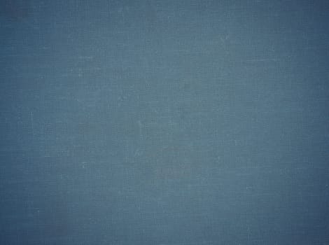 Old blue fabric cover can be used as background.