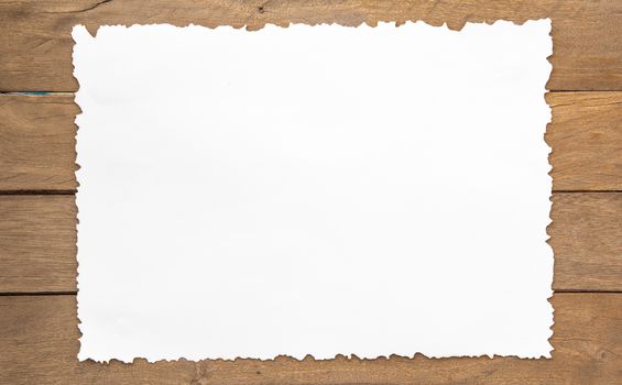 paper on wood background