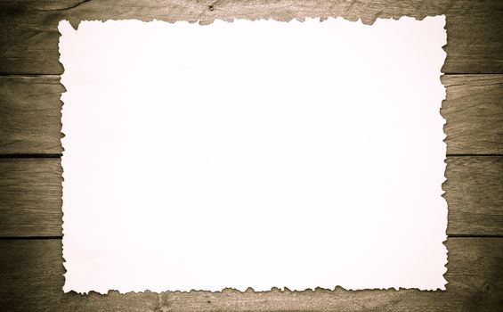 paper on wood background