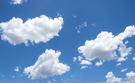 Abstract background of blue sky with white clouds and rain clouds.
