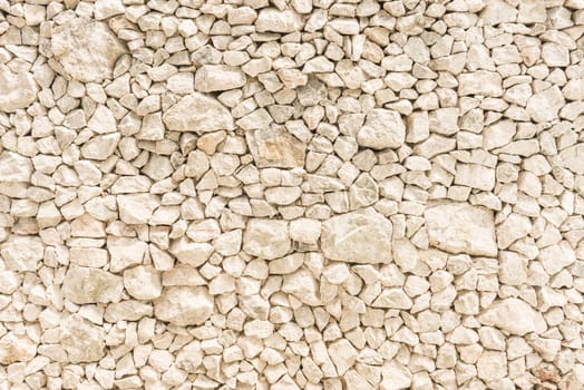 Stone walls caused by the specter of stone of various sizes.