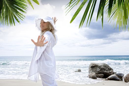 Portrait of nice young woman  having good time on tropical beach