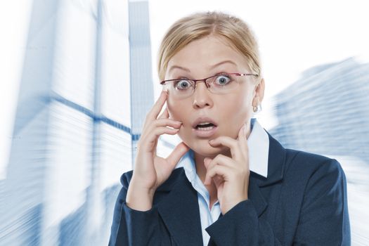 Portrait of young beautiful woman in office environment