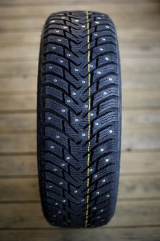 Studded tire on a background