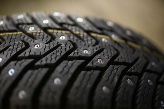 Studded tire on a background