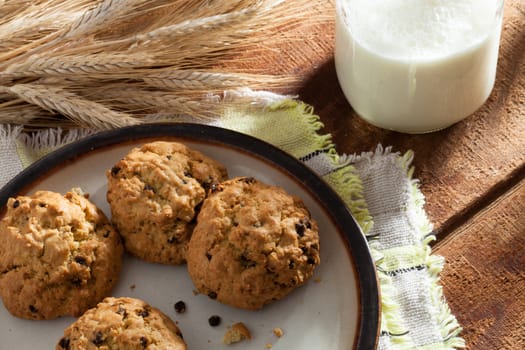 close up view of nice homemade cookies with milk