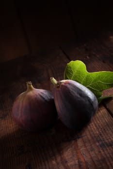 close up view of fresh figs on color back