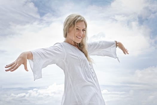 Portrait of nice young woman  having good time on  sky back