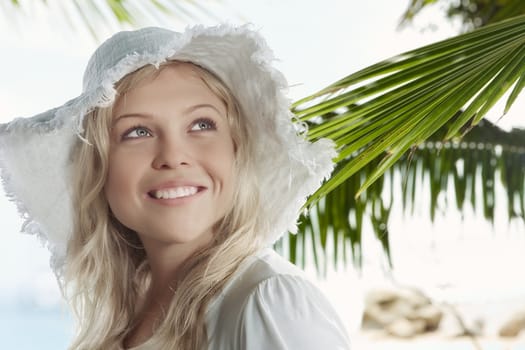 High key portrait of young beautiful woman  in summer environment