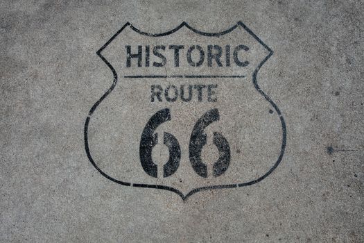 close up view of  historic rout 66 mark on asphalt  surface