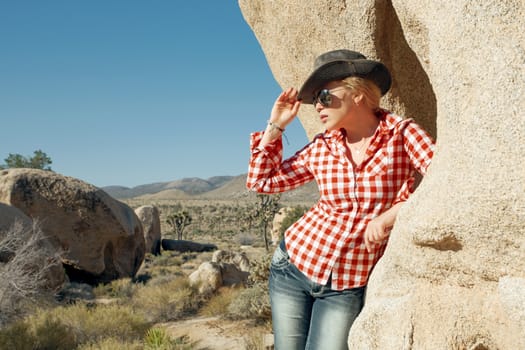 portrait of young beautiful girl in Joshua Tree park environment