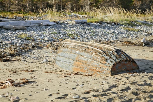 Old abandoned boat on a shore of White sea
