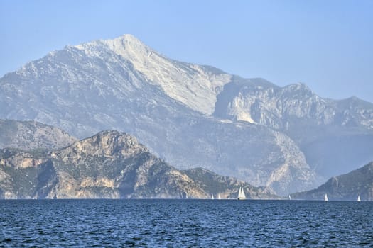 Yachting in Turkey - view of yachts and mountains from the sea