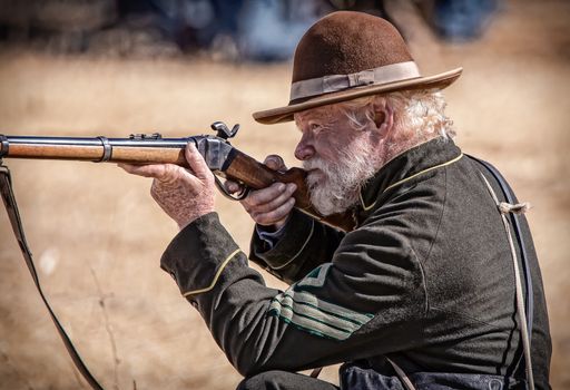 A union sniper takes aim at a target during a Civil War Reenactment at Anderson, California.
Photo taken on: September 27th, 2014
