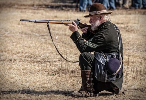 A union sniper takes aim at a target during a Civil War Reenactment at Anderson, California.
Photo taken on: September 27th, 2014