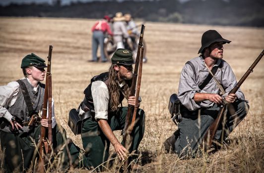 Rebel soldiers stand ready for combat during a Civil War Reenactment at Anderson, California.
Photo taken on: September 27th, 2014