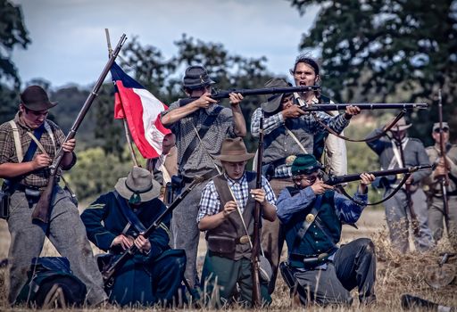Rebel soldiers stand ready for combat during a Civil War Reenactment at Anderson, California.
Photo taken on: September 27th, 2014