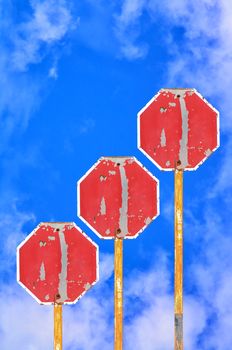 Many Old Traffic Signs on blue sky  background