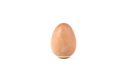Pear wooden egg on white background