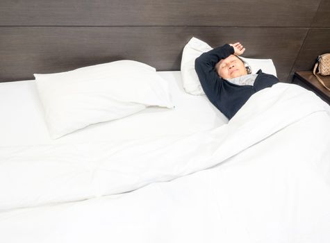 lonely senior woman  sleeping in the bed