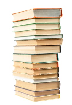 Pile of books isolated on white background, close up view