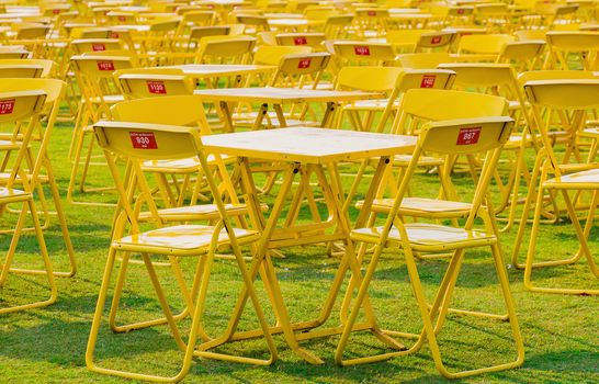 group of outdoor yellow table and chair