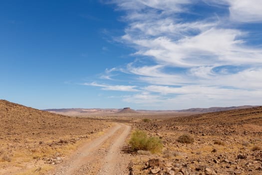 table mountain in the Sahara desert on a background of blue sky, Morocco
