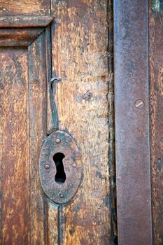 door in italy old ancian wood and traditional            texture nail