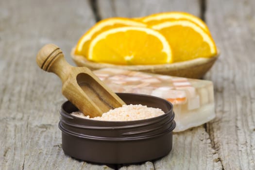 orange bath salt, soap and fresh fruits - beauty treatment