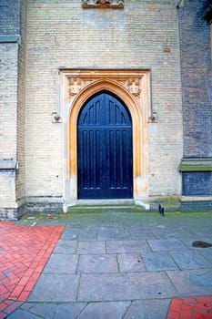 wooden parliament in london old   door and marble antique  wall