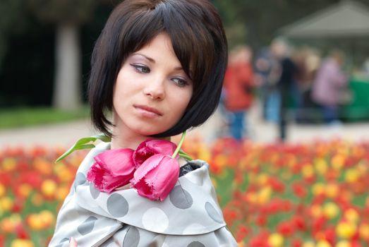 Pretty girl with tulips with soft background