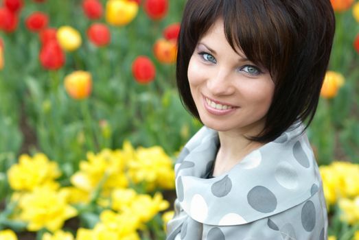 Pretty girl with tulips with soft background