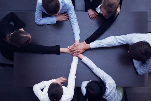 People with their hands together. Business team work concept